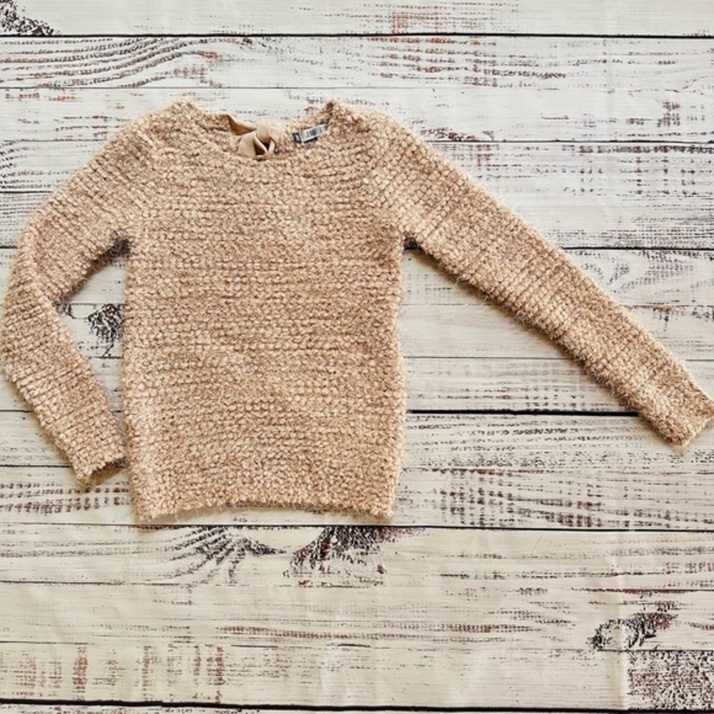 Jennifer Lopez pink sweater with bow!